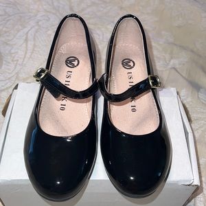 Little girl patent leather shoes